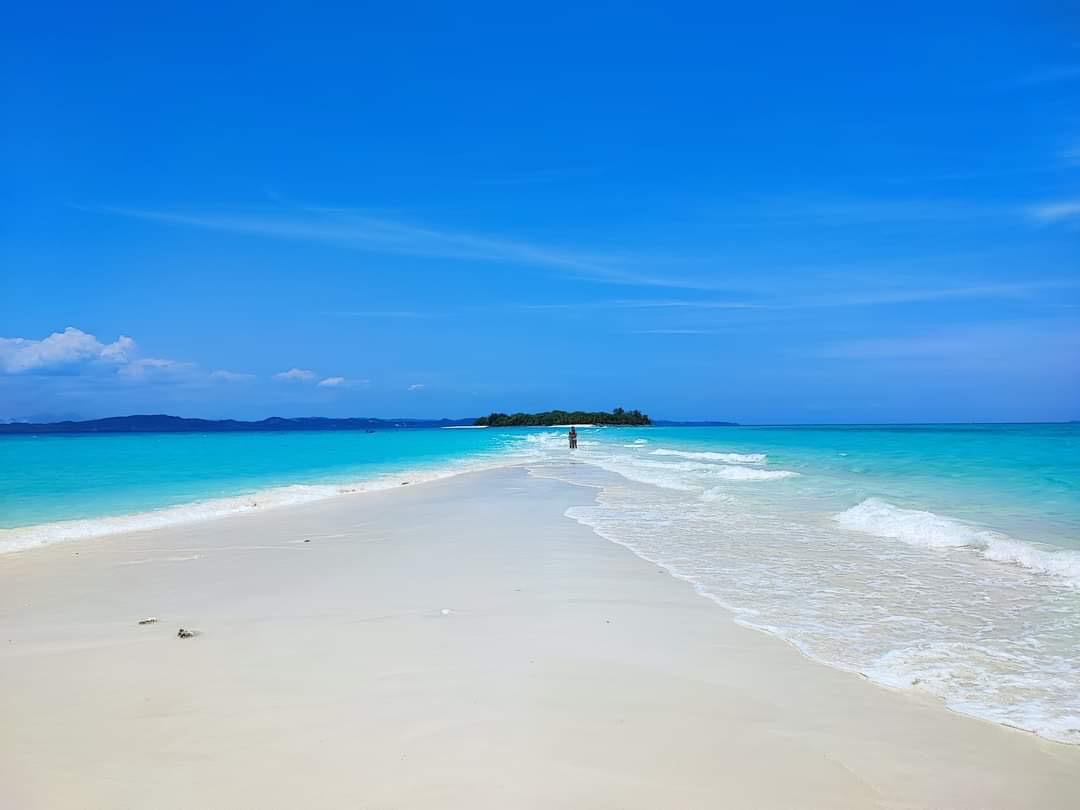 View over the Nosy Iranja sandbar and turquoise lagoon from the hillside